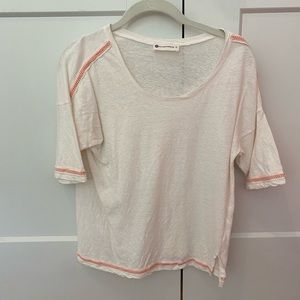 white with orange detail top